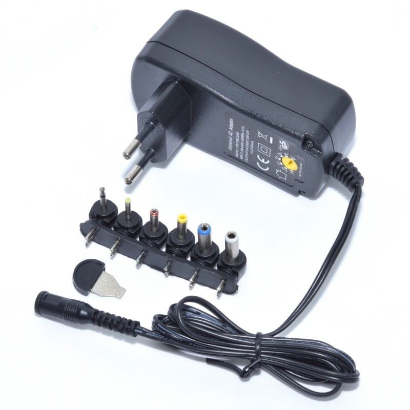 Alimentator stabilizat 220V cu tensiune reglabila 3-12V/1500mah si iesire USB Engros