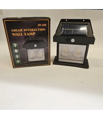 Lampă solară de perete cu senzor de mișcare –Engros  Două lămpi model BK-888i Lucrează cu energia solară